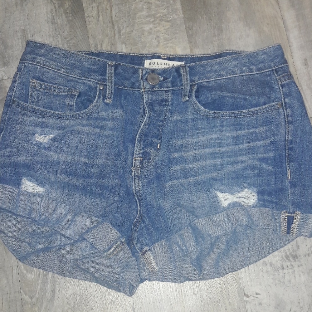 Light blue high waisted shorts.